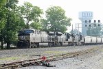 NS 4488 leads train 51J southbound with all company hoppers